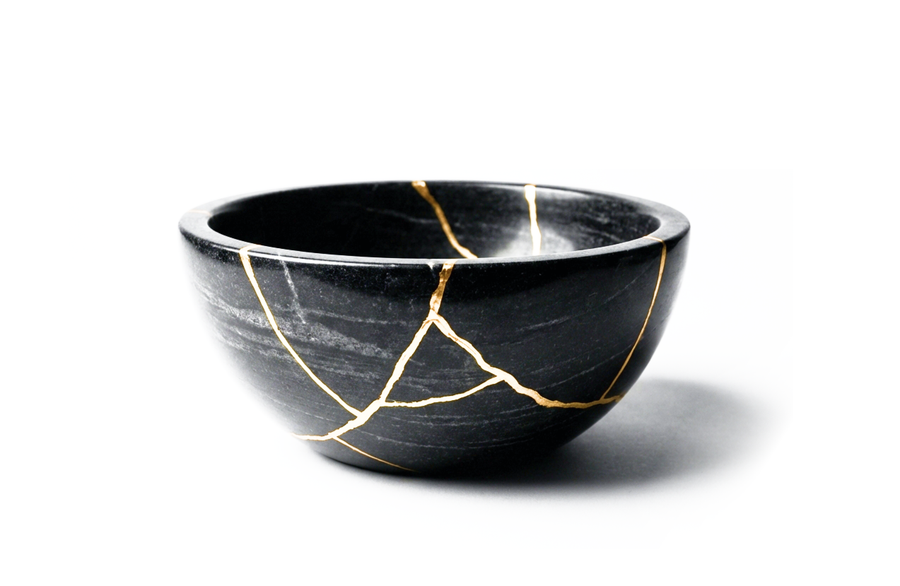 A black bowl fixed with gold, Kintsugi repair